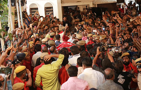 Party leaders, members and the public raised slogans in tribute as the bus arrived, and the first public viewing is happening at the house.