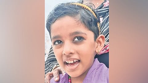 Standing on the terrace of a house, little Aira B Hameed began repeating the slogans being shouted by the crowd below.