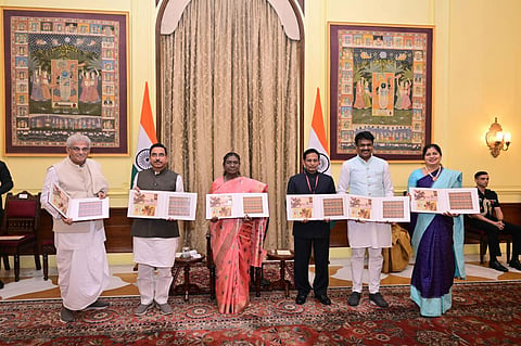 President Droupadi Murmu releases the postal stamp in New Delhi.