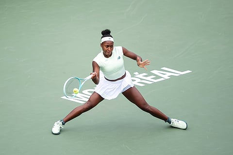 Coco Gauff, of the United States, returns a shot during third-round match action against Veronika Kudermetova at the National Bank Open women's tennis tournament in Montreal, Thursday, July 31, 2025.