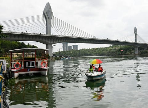 Tourists enjoy a boat ride at Durgam Cheruvu lake amdits a cloudy weather in Hyderabad