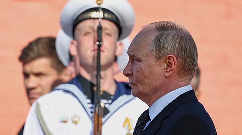 Russian President Vladimir Putin arrives to attend a flag-raising ceremony of the Knyaz Pozharsky nuclear-powered Borei-A-class submarine in Severodvinsk, Russia, Thursday, July 24, 2025.