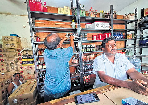 Tasmac sales staff at an outlet in Patravakkam in Chennai.