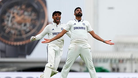 India's Mohammed Siraj, right, and Dhruv Jurel celebrate their win against England on day five of the fifth cricket test match between England and India at The Kia Oval in London, Monday, Aug. 4, 2025.