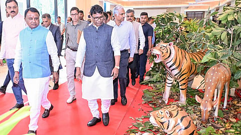CM Mohan Charan Majhi and Forest Minister Ganesh Ram Singkhuntia going round an exhibition at the DFO conference.