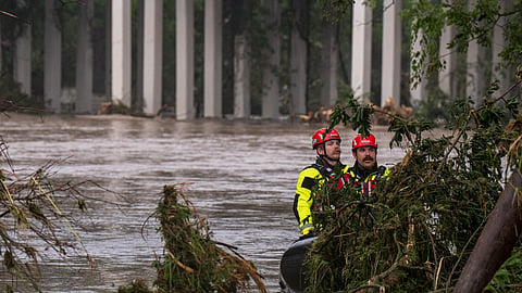 Trees emerge from flood waters along the Guadalupe River on July 4, 2025 in Kerrville, Texas.