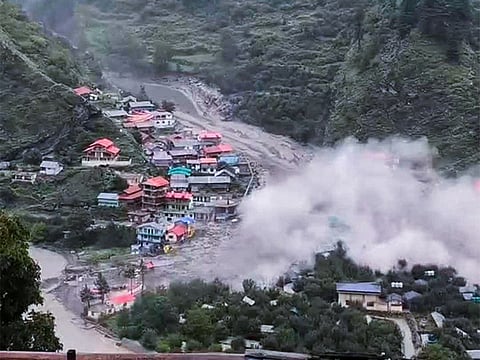 Houses being swept away in a flash flood triggered by a cloudburst at Dharali, in Uttarkashi district, Uttarakhand, Tuesday, Aug. 5, 2025.