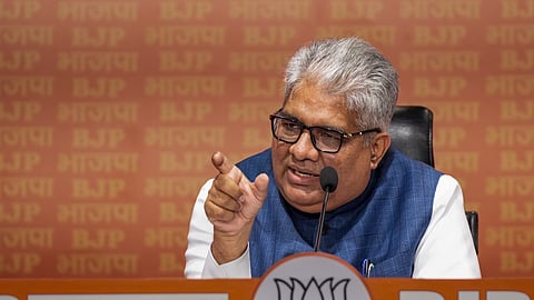 Union Minister and BJP leader Bhupender Yadav addresses a press conference at the party headquarters in New Delhi, Friday, Aug. 8, 2025.