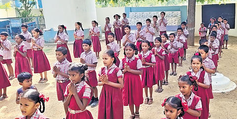 Students participating in prayer at Government Primary school, Anthampeta of Ghattuppal mandal, Nalgonda district.