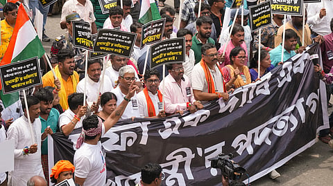 Protestors take part in a march to the West Bengal secretariat 'Nabanna' to mark the completion of one year of the rape and murder of a trainee doctor at RG Kar hospital, in Howrah district of West Bengal, Saturday, Aug. 9, 2025.