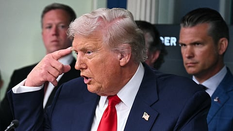 US President Donald Trump gestures while speaking during a news conference to discuss crime in Washington, DC, in the Brady Press Briefing Room at the White House in Washington, DC, on August 11, 2025.