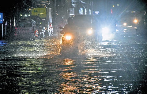 A water logged road in Vijayawada after a downpour.