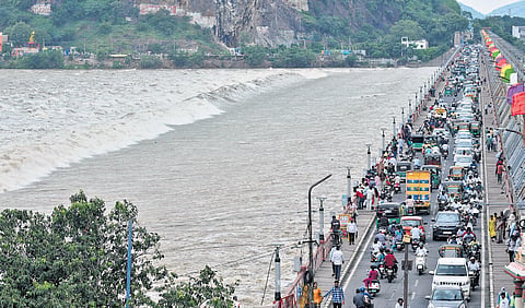 The authorities are releasing over 5.60 lakh cusecs of water by lifting all crest gates of Prakasam Barrage in Vijayawada on Thursday.
