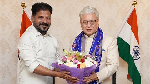 Chief Minister A Revanth Reddy (L) and Governor Jishnu Dev Varma
