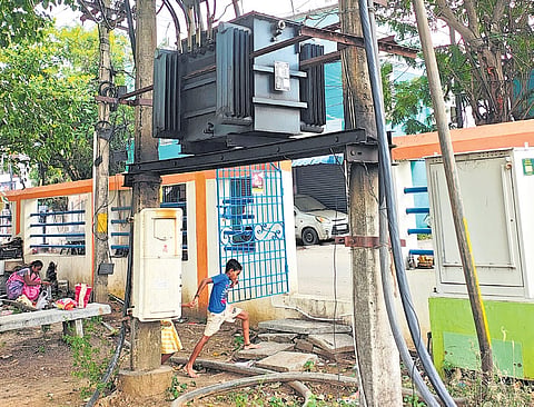 A poorly-maintained TNEB transformer kept inside Selliamman temple at Keelkattalai poses threat to residents.