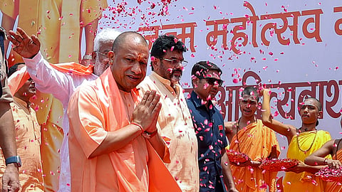 Yogi Adityanath at Krishna Janmasthan Temple on the occasion of Janmashtami festival, in Mathura, Saturday.