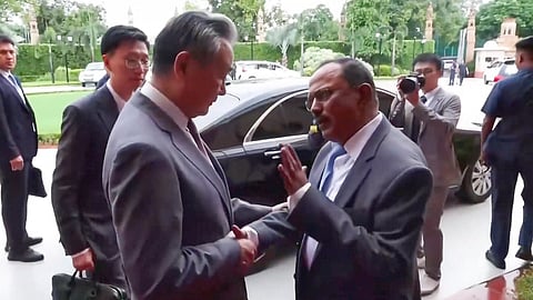 National Security Advisor Ajit Doval being greeted by China's Foreign Minister Wang Yi after their meeting at Hyderabad House, in New Delhi, Tuesday, Aug. 19, 2025.
