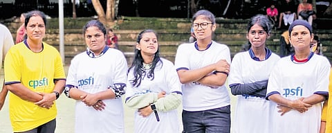 Indian team members with their coach