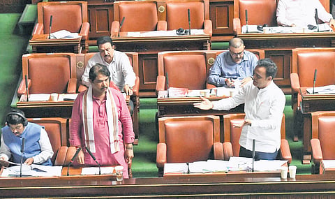 Leader of Opposition in the Assembly R Ashoka and BJP MLA Dr CN Ashwath Narayan speak in the House at Vidhana Soudha on Wednesday