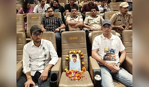 Pic of both sons of Kanhaiyalal Tailor with pic of father at Udaipur Cinema hall at the time of first show of the film.