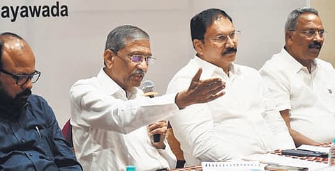 AP Chamber of Commerce president Potluri Bhaskara Rao addressing during the affiliates council meeting in Vijayawada on Thursday.