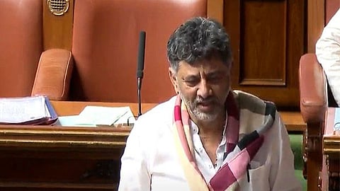 DK Shivakumar recites RSS anthem in the Assembly amid debate over Bengaluru stampede.