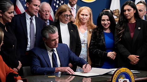 California Gov. Gavin Newsom signs legislation calling for a special election on a redrawn congressional map on Thursday, Aug. 21, 2025, in Sacramento, Calif.