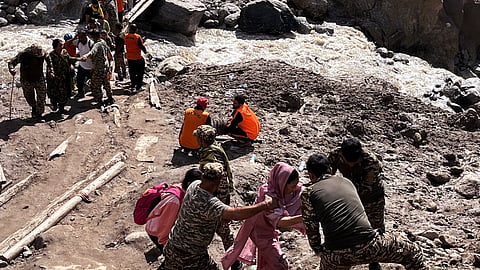 Indian Army, SDRF, Police and local administration carry out a search and rescue operation in flash flood-hit Chasoti Village, in Kishtwar on Monday.