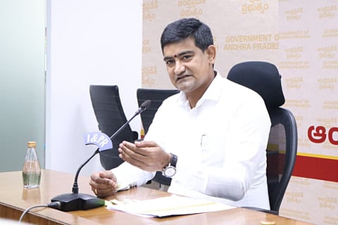 Minister Kondapalli Srinivas addressing the media.