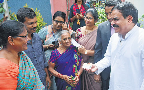 Civil Supplies Minister N Manohar distributes new ration cards to people in Vijayawada