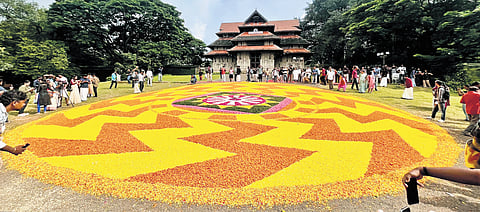 A 60-feet Athapookkalam made by over 150 members of Sayahna Souhruda Kootayma using 1,500kg of flowers at Thekkinkad Maidan at the Thekke Gopura Nada of Vadakkumnathan Temple on Tuesday