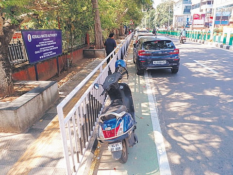 Vehicles parked at the cycle track on the Vellayambalam-Thycaud road
