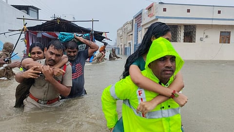 Fire Officials and Police have safely rescued 10 people in Ramayampet, in Medak district, who were stranded in their houses, in Flood water on Wednesday