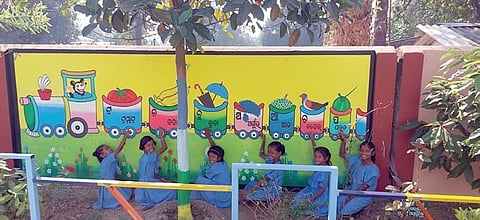 Children playing on the campus at Kondel UP School