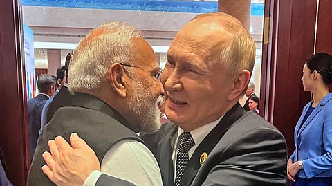 Russian President Vladimir Putin hugs Indian Prime Minister Narendra Modi ahead of the Shanghai Cooperation Organization (SCO) summit at the Meijiang Convention and Exhibition Center in Tianjin, China, Monday, Sept. 1, 2025.