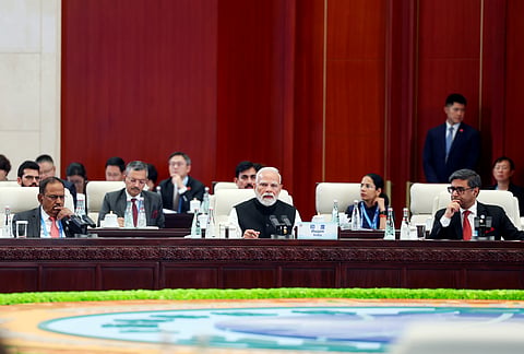 Prime Minister Narendra Modi delivers India's statement at the Shanghai Cooperation Council (SCO) Members Session in Tianjin, China on Monday. National Security Advisor (NSA) Ajit Doval and Foreign Secretary Vikram Misri also present.
