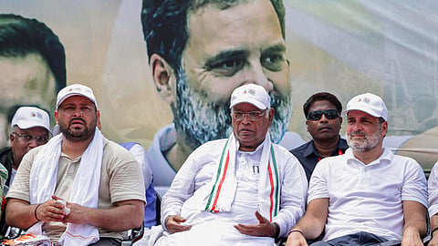 Lok Sabha LoP and Congress MP Rahul Gandhi, party president Mallikarjun Kharge and LoP in Bihar Legislative Assembly and RJD leader Tejaswi Yadav during a roadshow on the conclusion of the 'Voter Adhikar Yatra', in Patna on Monday.