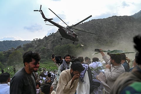 A military helicopter airlifts injured Afghans after earthquakes at Mazar Dara village in Nurgal district, Kunar province, in Eastern Afghanistan, on September 1, 2025. More than 800 people have died and over 2,700 were injured from August 31 night to September 1, 2025, in eastern Afghanistan after a 6-magnitude earthquake, followed by at least five aftershocks felt hundreds of kilometers away.