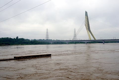 Yamuna river flows in spate as it crosses the danger mark following incessant rainfall, in Wazirabad area, New Delhi, Tuesday, Sep. 02, 2025.
