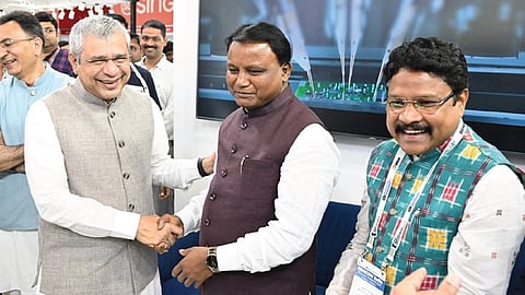 Union IT minister Ashwini Vaishnaw sharing a lighter moment with CM Mohan Charan Majhi at Odisha Pavilion in SEMICON-2025. Health min Mukesh Mahaling also present