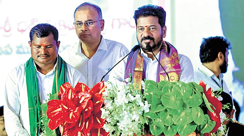 Chief Minister A Revanth Reddy addresses a public meeting at Dameracherla village in Chandrugonda mandal in Bhadradri Kothagudem district on Wednesday.