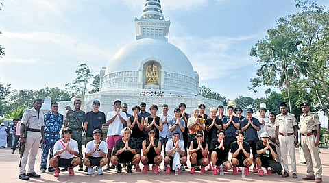 Japanese team in front of the Vishwa Shanti Stupa in Rajgir.