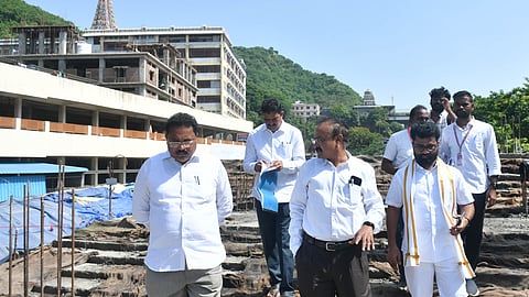 Endowments commissioner K Ramachandra Mohan inspects development works at the Arjun street of Kanaka Durga temple in Vijayawada on Monday.