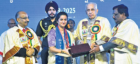 Governor S Abdul Nazeer presenting degrees to students at the convocation of
Dr NTR University of Health Sciences in Vijayawada on Tuesday.