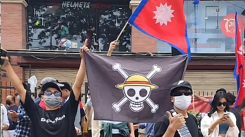 Protesters waved the Jolly Roger of the Straw Hat Pirates during the demonstrations.