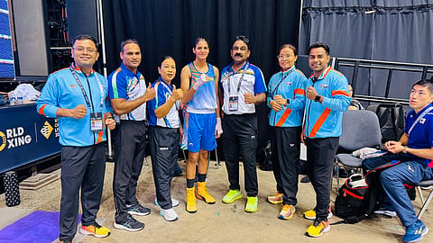 Jaismine Lamboria (C) with the coaches and support staff members after her win on Wednesday