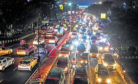 Clockwise: Traffic on a normal day in the city; man rides a two-wheeler without a helmet; vehicles on a busy road stretch; and a tractor approaching the road from the wrong direction