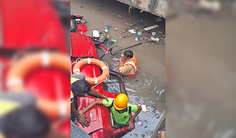 Fire and rescue service personnel during the rescue operation in the drainage canal near the PRC depot.