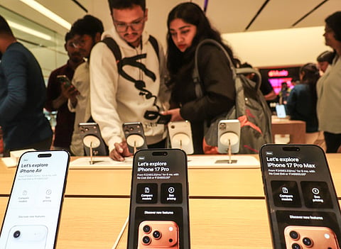 People check out devices at Apple Store at Phoenix Mall Of Asia, Bangalore