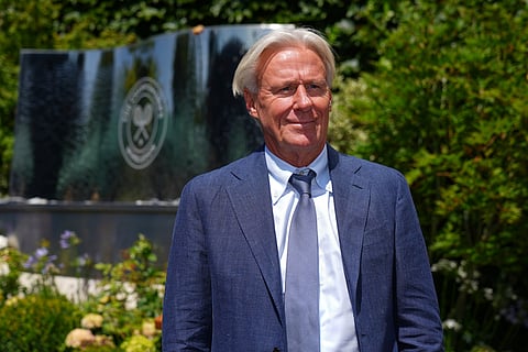Tennis great Bjorn Borg poses for a photo as he arrives for Day 11 at the Wimbledon Tennis Championships in London, July 10, 2025.